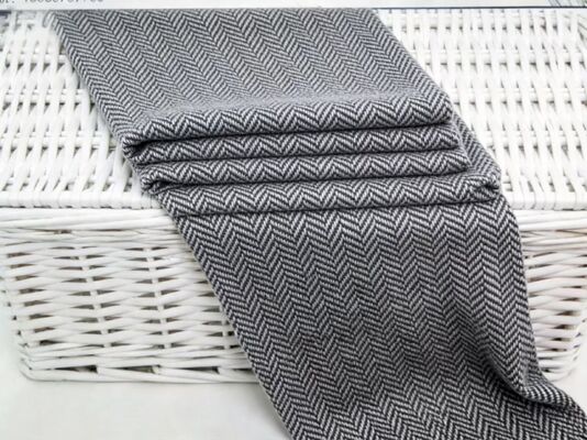 225 GSM Herringbone 50% Wolle Mantel Anzug Stoff Zeitlose Eleganz mit edlem europäischen Stil